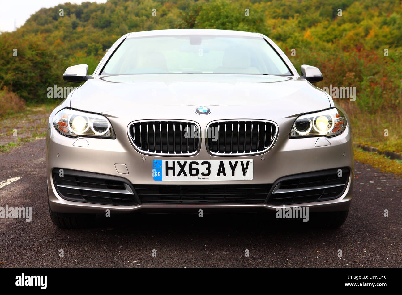 BMW 5-Series Saloon Car in Cashmere Silver F11 2013 Facelift Version Stock Photo