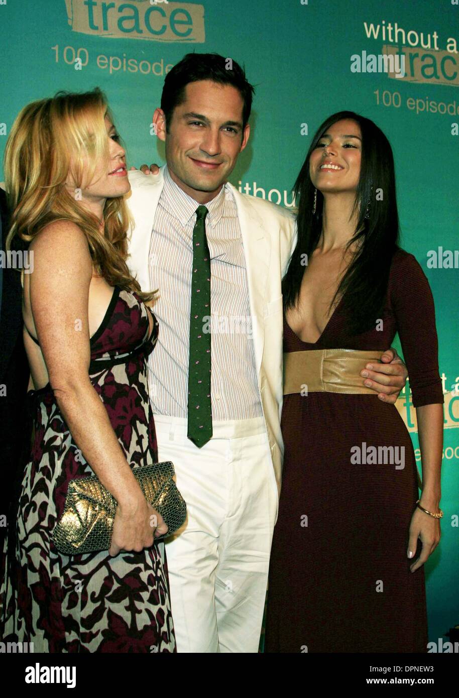 Sept. 9, 2006 - Hollywood, CALIFORNIA, USA - POPPY MONTGOMERY, ENRIQUE MURCIANO AND ROSELYN SANCHEZ -.WITHOUT A TRACE 100TH EPISODE PARTY -.CABANA CLUB, HOLLYWOOD, CALIFORNIA - .09-09-2006 -. NINA PROMMER/   2006.K49298NP(Credit Image: © Globe Photos/ZUMAPRESS.com) Stock Photo