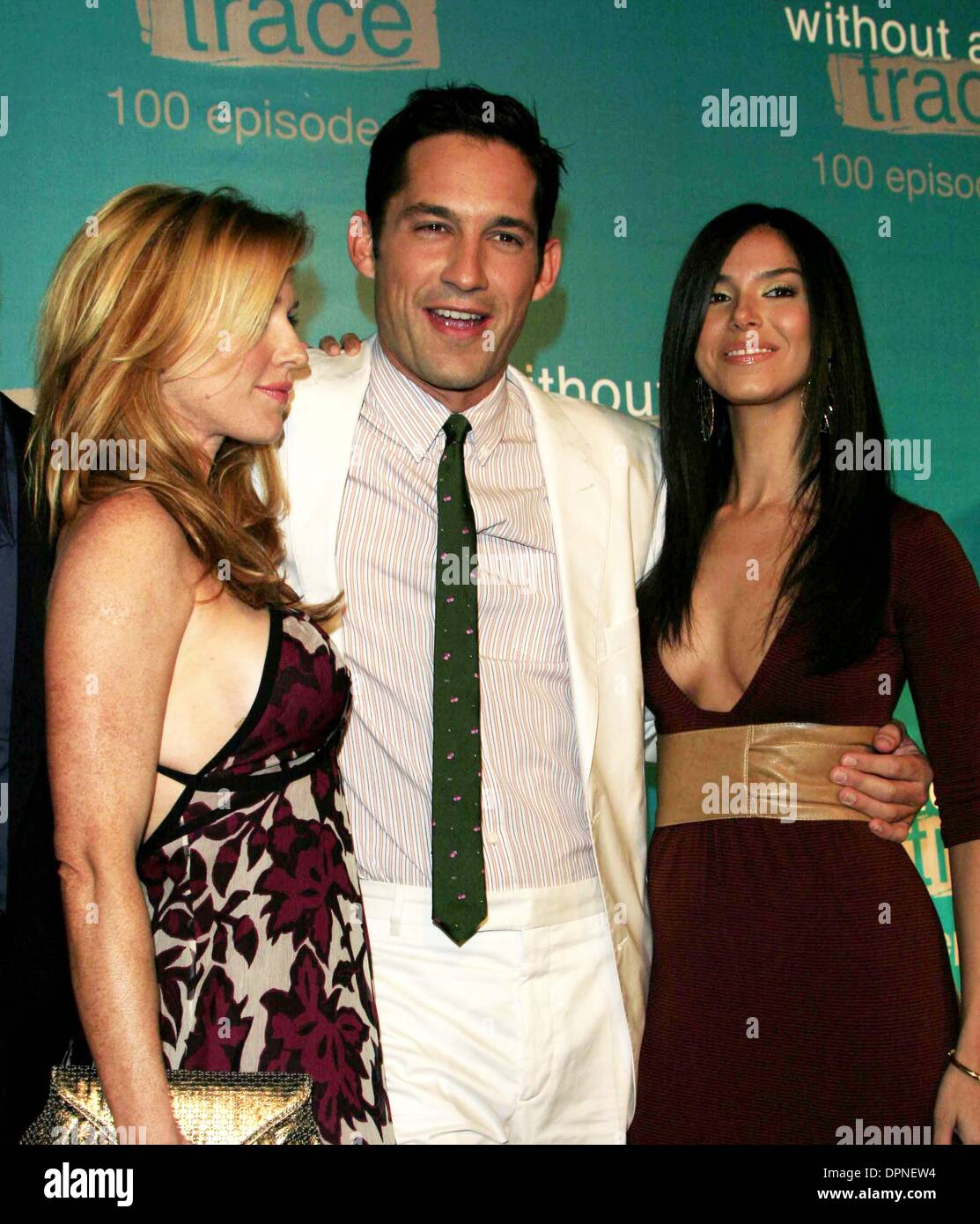 Sept. 9, 2006 - Hollywood, CALIFORNIA, USA - POPPY MONTGOMERY, ENRIQUE MURCIANO AND ROSELYN SANCHEZ -.WITHOUT A TRACE 100TH EPISODE PARTY -.CABANA CLUB, HOLLYWOOD, CALIFORNIA - .09-09-2006 -. NINA PROMMER/   2006.K49298NP(Credit Image: © Globe Photos/ZUMAPRESS.com) Stock Photo