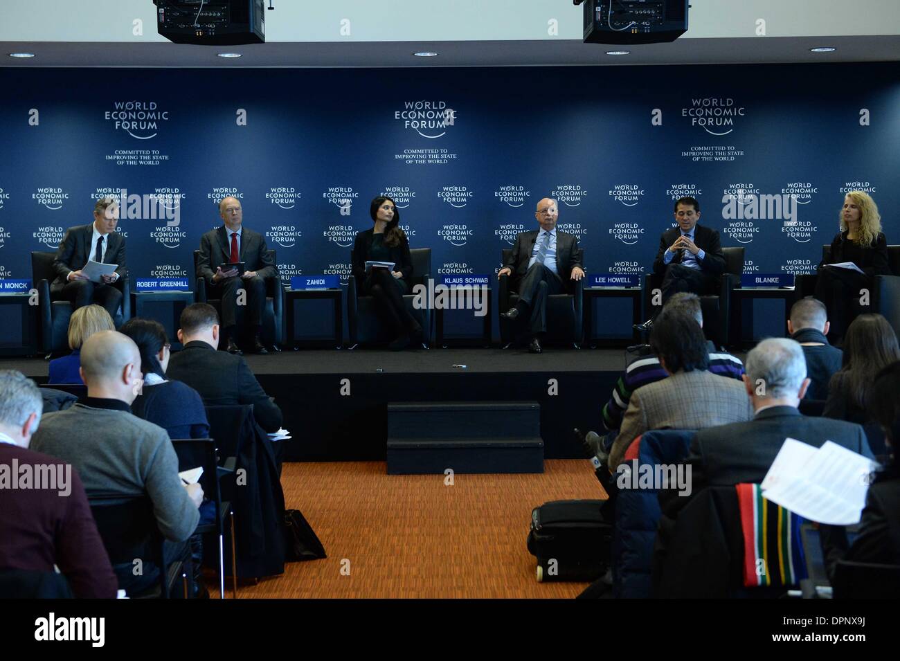 Geneva, WEF headquarters in Geneva. 15th Jan, 2014. Klaus Schwab (3rd R rear), founder and executive chairman of the World Economic Forum (WEF), addresses a press conference at the WEF headquarters in Geneva, Jan. 15, 2014. The World Economic Forum (WEF) Annual Meeting scheduled for Jan. 22-26 in Davos of Switzerland would be a platform for global elites to probe into a variety of underlining issues in today's world, said founder of WEF on Wednesday. Credit:  Wang Siwei/Xinhua/Alamy Live News Stock Photo