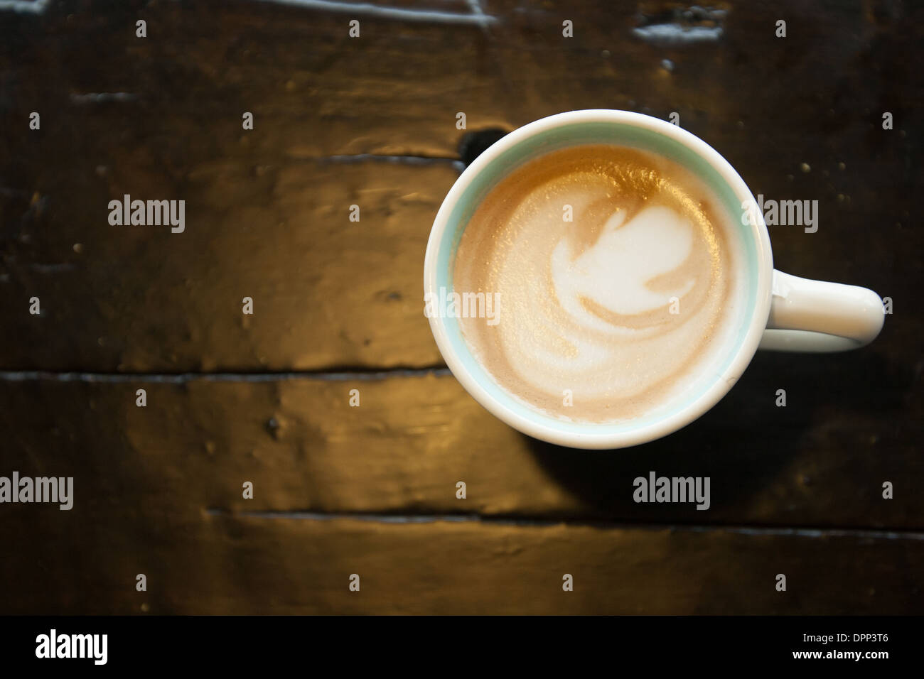 Cup of Coffee on wood surface Stock Photo