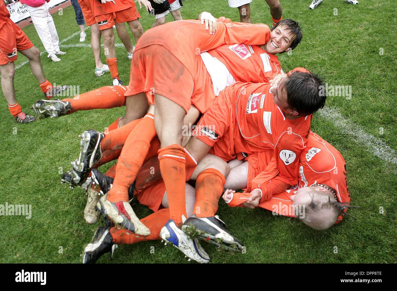May 21, 2006 - Upton Park Stadium, LONDON, ENGLAND - HOLLYOAKS PLAYERS.CELEBRATE WINNING THE FINAL AT THE 2006 CELEBRITY WORLD CUP SOCCER SIXES TOURNAMENT AT UPTON PARK, WEST HAM UNITED'S FOOTBALL GROUND IN LONDON. 05-21-2006.Â©  -   K48038.(Credit Image: © Globe Photos/ZUMAPRESS.com) Stock Photo