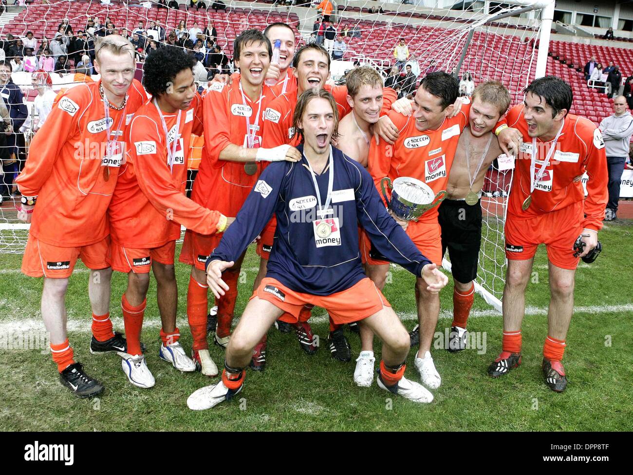 May 21, 2006 - Upton Park Stadium, LONDON, ENGLAND - HOLLYOAKS TEAM.ENJOYING VICTORY TOGETHER AFTER WINNING THE AT THE 2006 CELEBRITY WORLD CUP SOCCER SIXES TOURNAMENT AT UPTON PARK, WEST HAM UNITED'S FOOTBALL GROUND IN LONDON. 05-21-2006.Â©  -   K48038.(Credit Image: © Globe Photos/ZUMAPRESS.com) Stock Photo