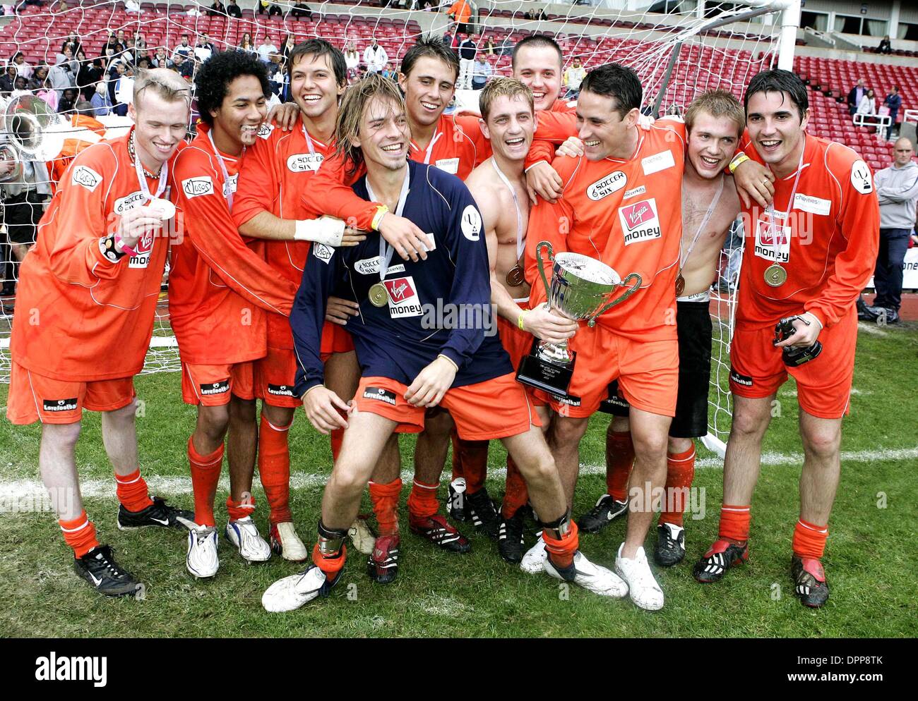 May 21, 2006 - Upton Park Stadium, LONDON, ENGLAND - HOLLYOAKS TEAM.ENJOYING VICTORY TOGETHER AFTER WINNING  THE 2006 CELEBRITY WORLD CUP SOCCER SIXES TOURNAMENT AT UPTON PARK, WEST HAM UNITED'S FOOTBALL GROUND IN LONDON. 05-21-2006.Â©  -   K48038.(Credit Image: © Globe Photos/ZUMAPRESS.com) Stock Photo