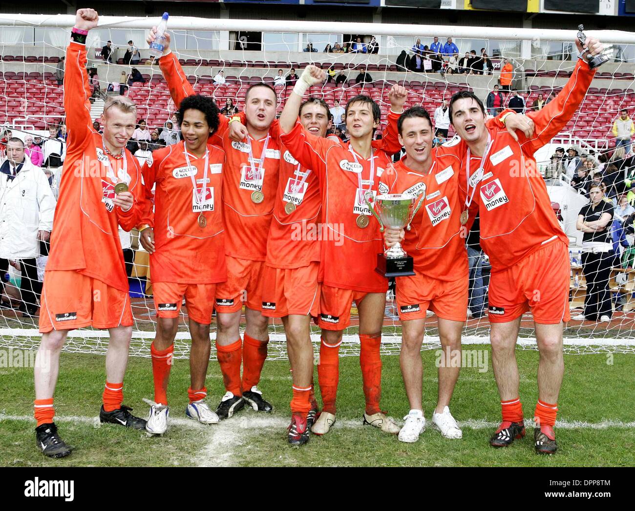May 21, 2006 - Upton Park Stadium, LONDON, ENGLAND - HOLLYOAKS TEAM.ENJOYING VICTORY TOGETHER AFTER WINNING THE 2006 CELEBRITY WORLD CUP SOCCER SIXES TOURNAMENT AT UPTON PARK, WEST HAM UNITED'S FOOTBALL GROUND IN LONDON. 05-21-2006.Â©  -   K48038.(Credit Image: © Globe Photos/ZUMAPRESS.com) Stock Photo