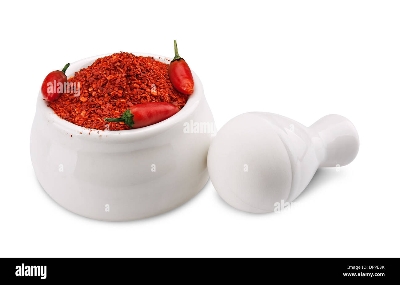 Crushed Chillies in the white ceramic mortar isolated Stock Photo