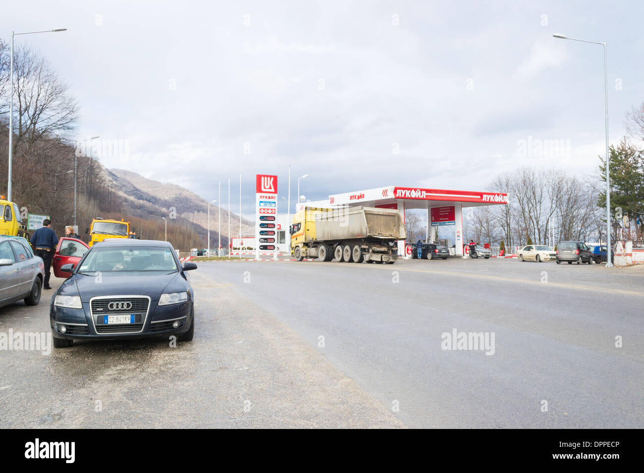 Truck in front of Lukoil gas station - Straja halt on a mountain gorge on the road between Skopje and Ohrid, Macedonia / FYROM Stock Photo