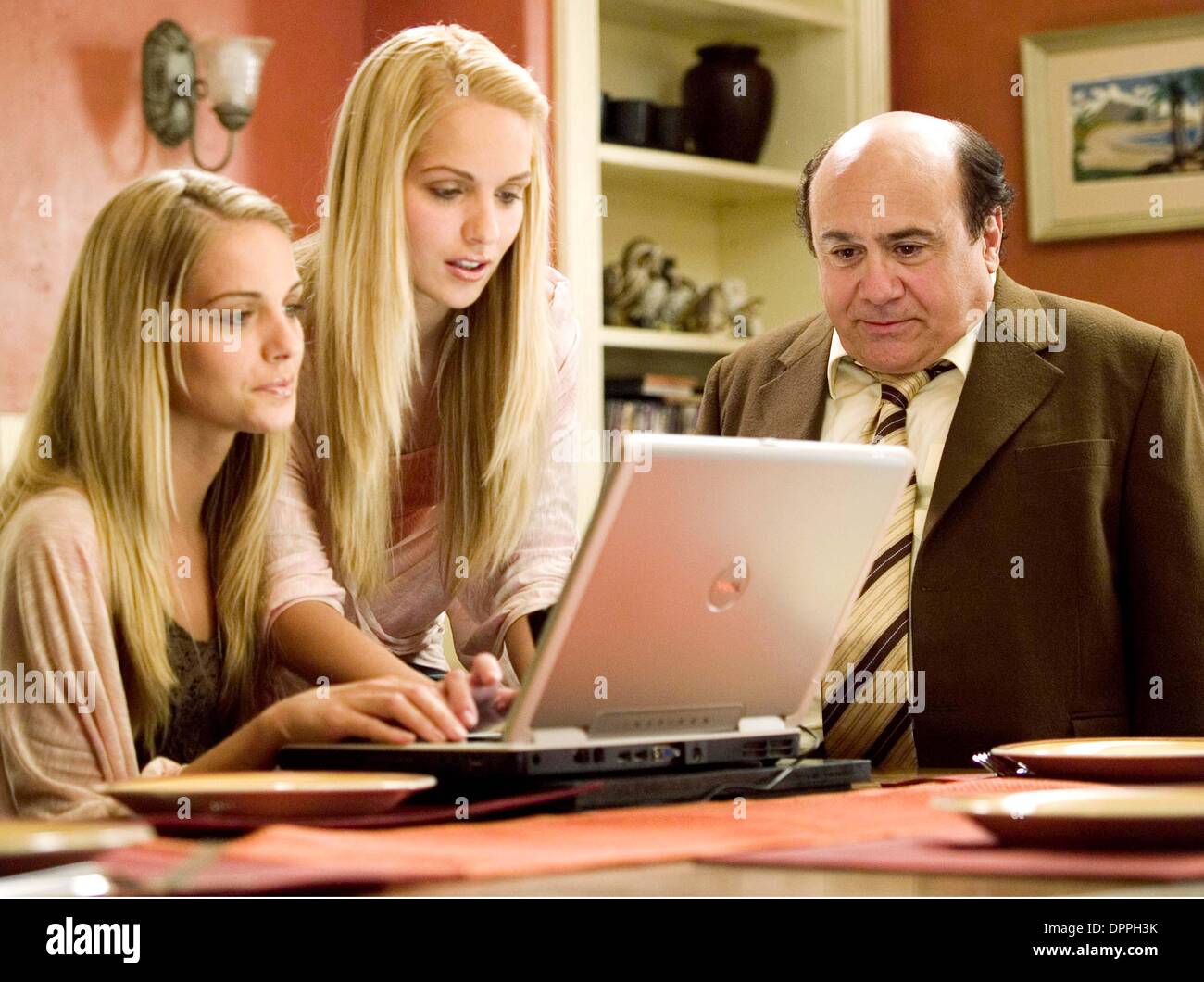 Oct. 30, 2006 - Buddy Hall (Danny DeVito) watches his twin daughters Ashley (Sabrina Aldridge) and Emily (Kelly Adridge) do some critical work for him.K51213ES.'' DECK THE HALLS ''.TV-FILM STILL. SUPPLIED BY    2006.(Credit Image: © Globe Photos/ZUMAPRESS.com) Stock Photo