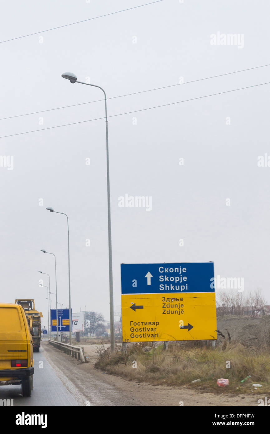 Driving in Macedonia road sign indicating directions to Skopje Stock