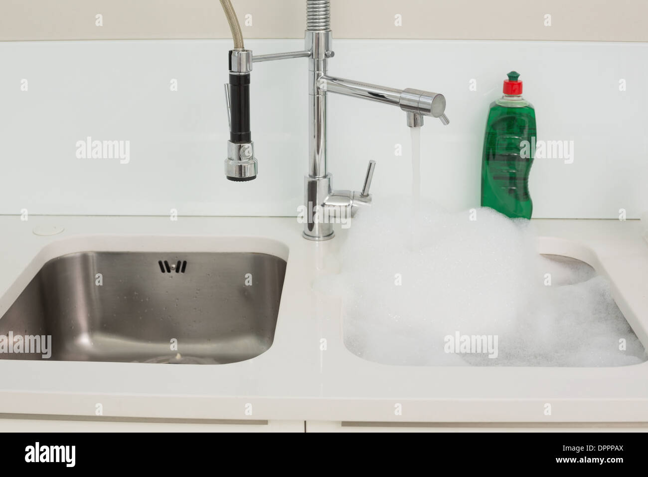 Close up of foam in kitchen sink Stock Photo Alamy