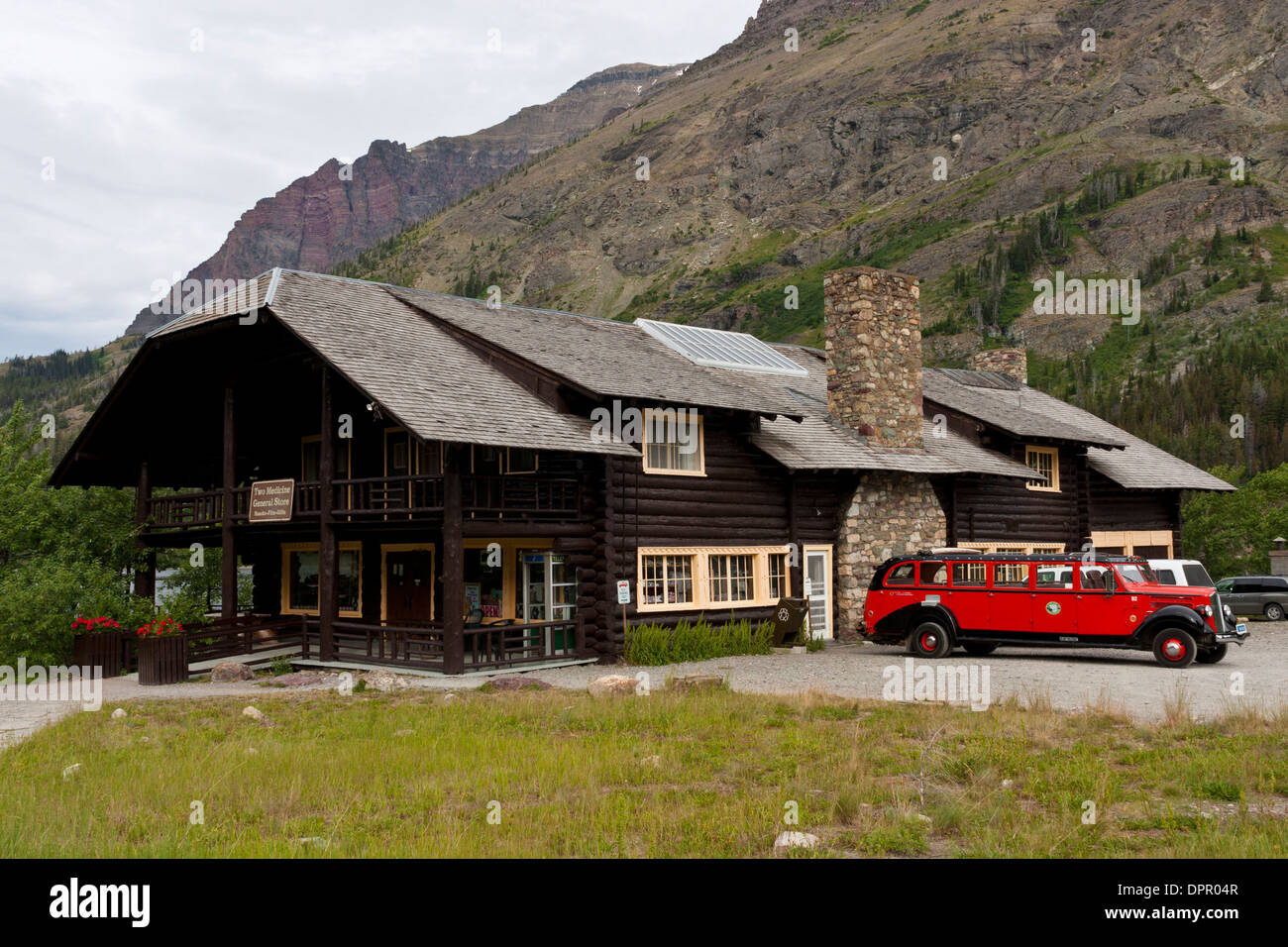 Red Jammer Bus at Two Medicine General Store in Glacier National Park, Montana. Stock Photo