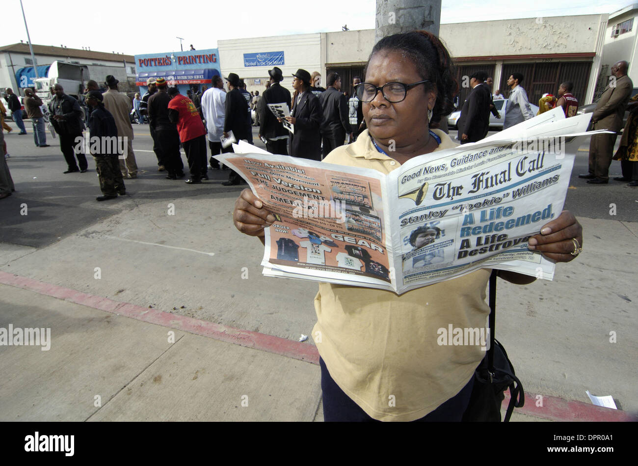 Dec. 20, 2005 - Los Angeles, California, USA - Sandra Smith reads the Nation of Islam newspaper, The Final Call, while waiting for the Stanley ''Tookie'' Williams memorial service to begin at the Bethel A.M.E. Church in Los Angeles, CA., on Tuesday, Dec. 20, 2005. An overflow crowd of 1,500 in the pews and hundreds more in the parking lot heard eulogies by Minister Louis Farrakhan, Stock Photo