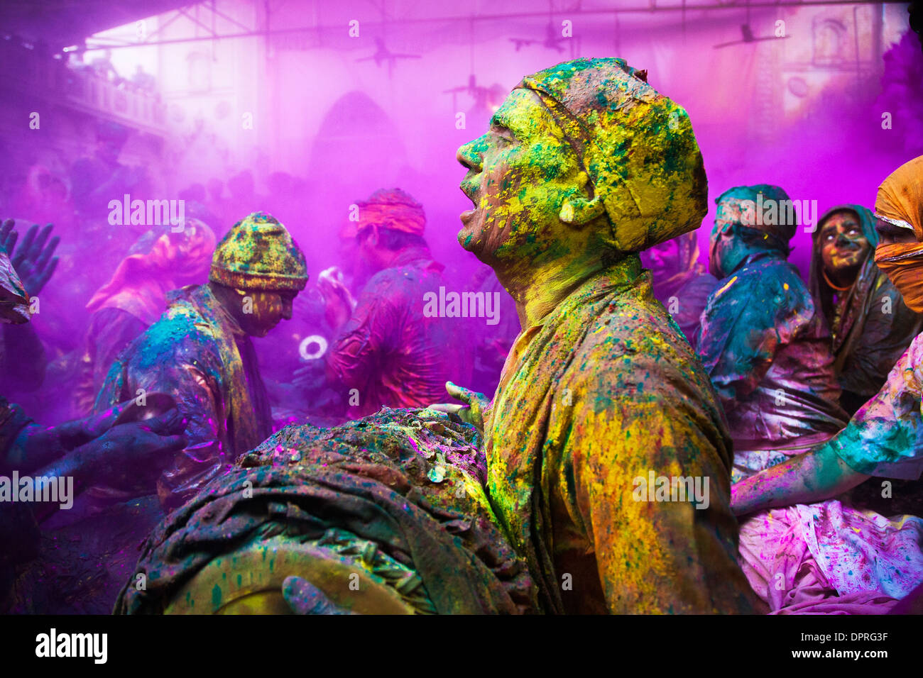 Men from Nandgaon & Barsana sit face to face in a Samaaj (a community gathering) during the festival of Holi Uttar Pradesh India Stock Photo