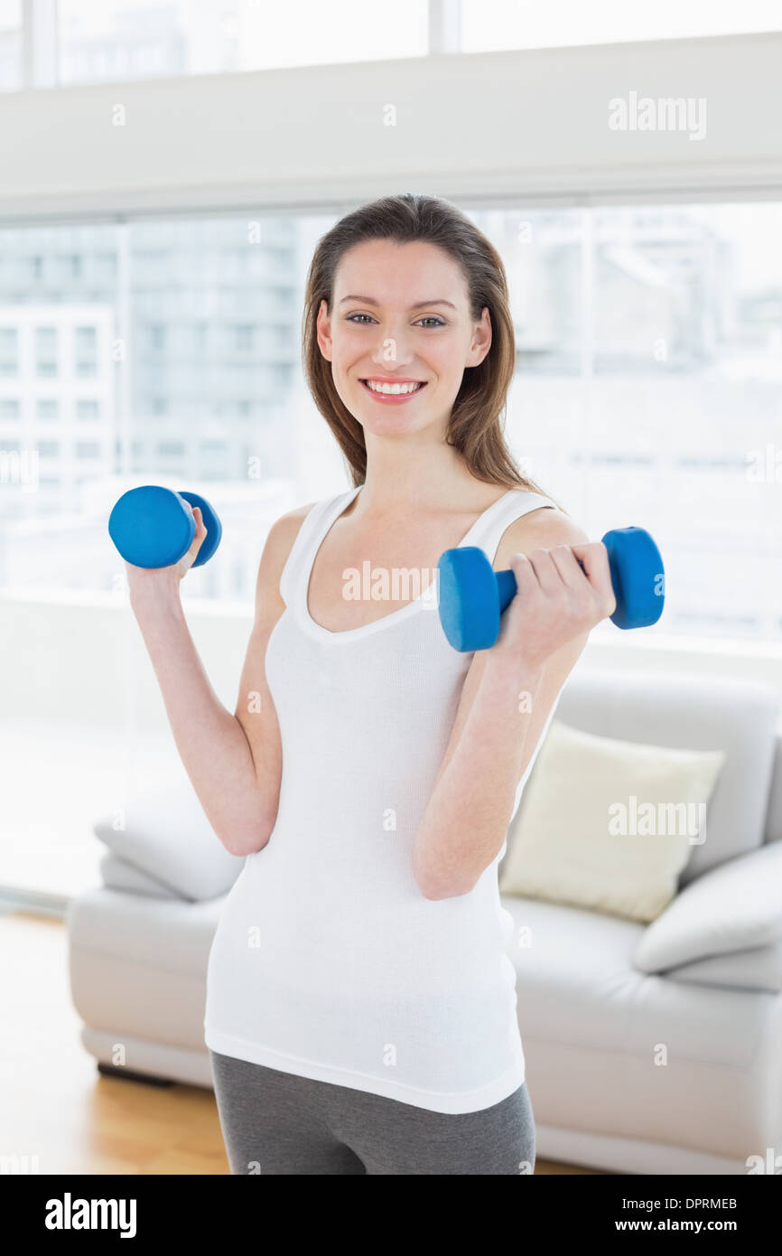Beautiful slim young fitness brunette hi-res stock photography and