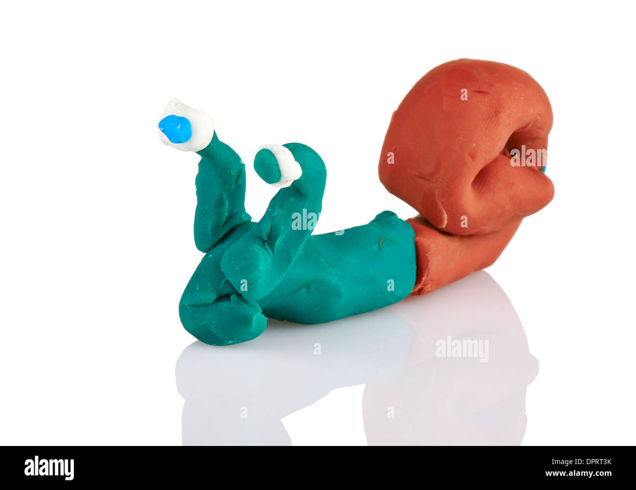 children's toy molded from clay - snail Stock Photo