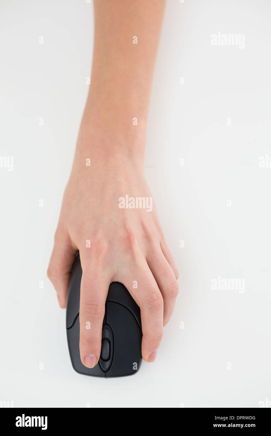 Close up of a hand using computer mouse Stock Photo