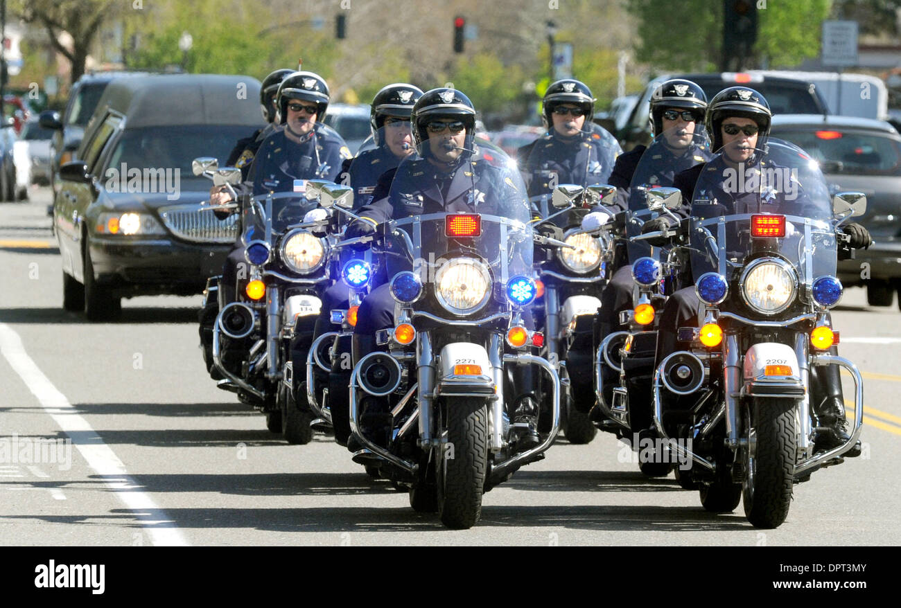 Members of the Oakland Police Department lead a motorcade for Oakland Police Officer Ervin Romans, of Danville, Calif. to St. Isidore's Catholic Church on Thursday, March 26, 2009. Romans, and three other Oakland Police officers were killed in the line of duty on Saturday, March 21, 2009.  (Doug Duran/Staff) Stock Photo