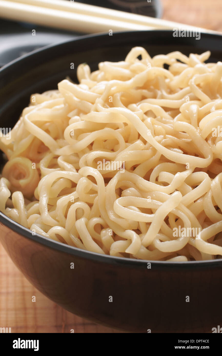 Ramen Noodles in lacquer bowls with chopsticks Stock Photo