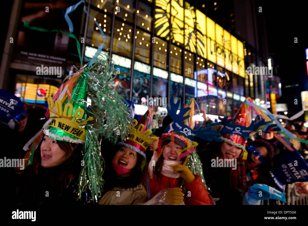 Dec 31, 2008 - New York, New York, USA - (L-R) Emiko Katano, Kana Chiguchi and Naoko Miyata all from Nagoya, Japan, take part in the New Year's Eve festivities in New York's Times Square. (Credit Image: © Mehmet Demirci/ZUMA Press) Stock Photo