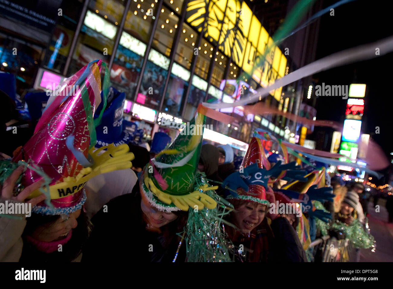 Dec 31, 2008 - New York, New York, USA - Revellers take part in the New Year's Eve festivities in New York's Times Square. (Credit Image: © Mehmet Demirci/ZUMA Press) Stock Photo
