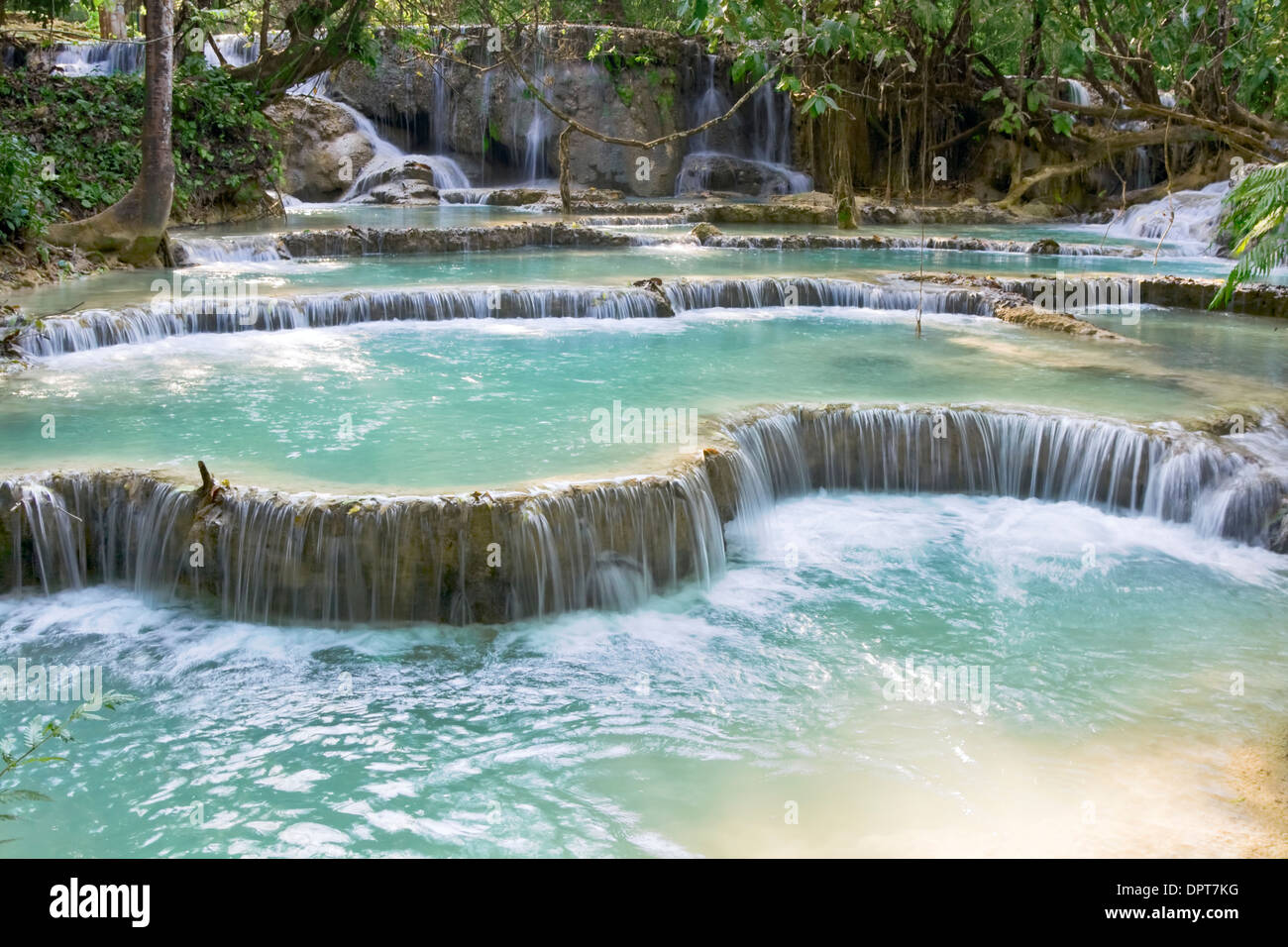 Pool and waterfall in the Tat Kuang Si waterfall system near Luang Prabang in Laos Stock Photo