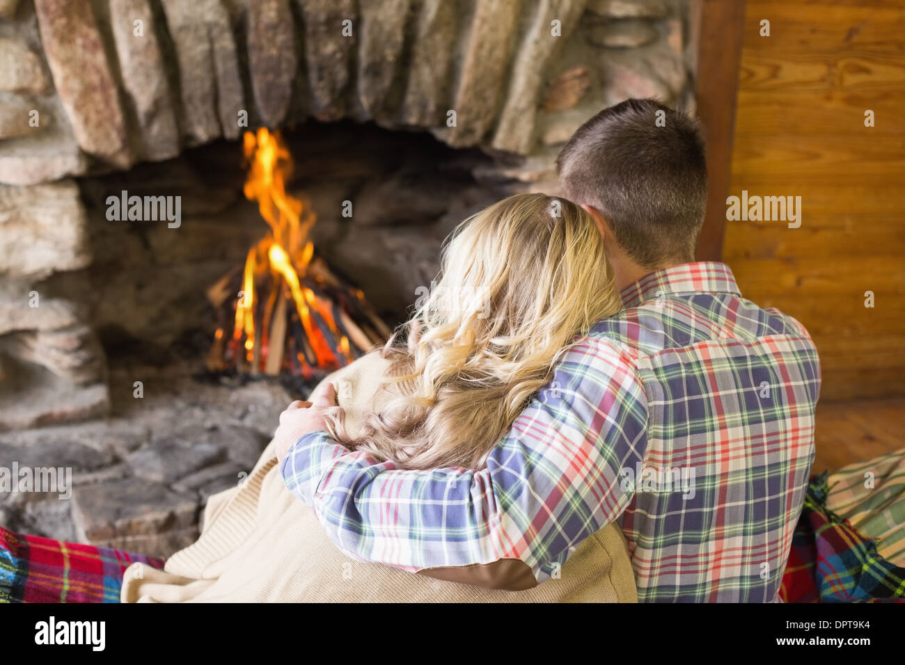 Sitting In Front Of Fireplace High Resolution Stock Photography and