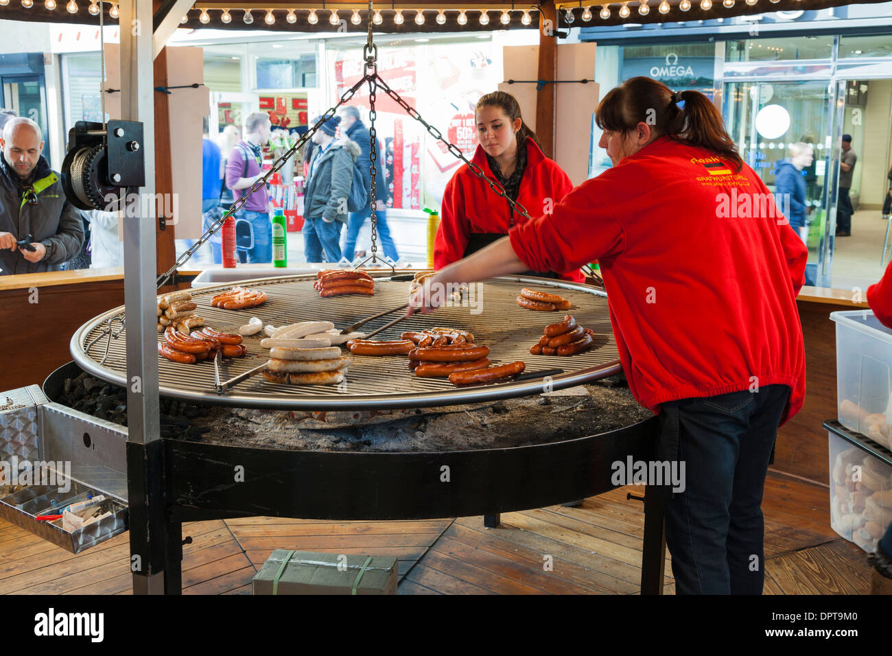 German sausage stall at tradition christmas street market. Stock Photo