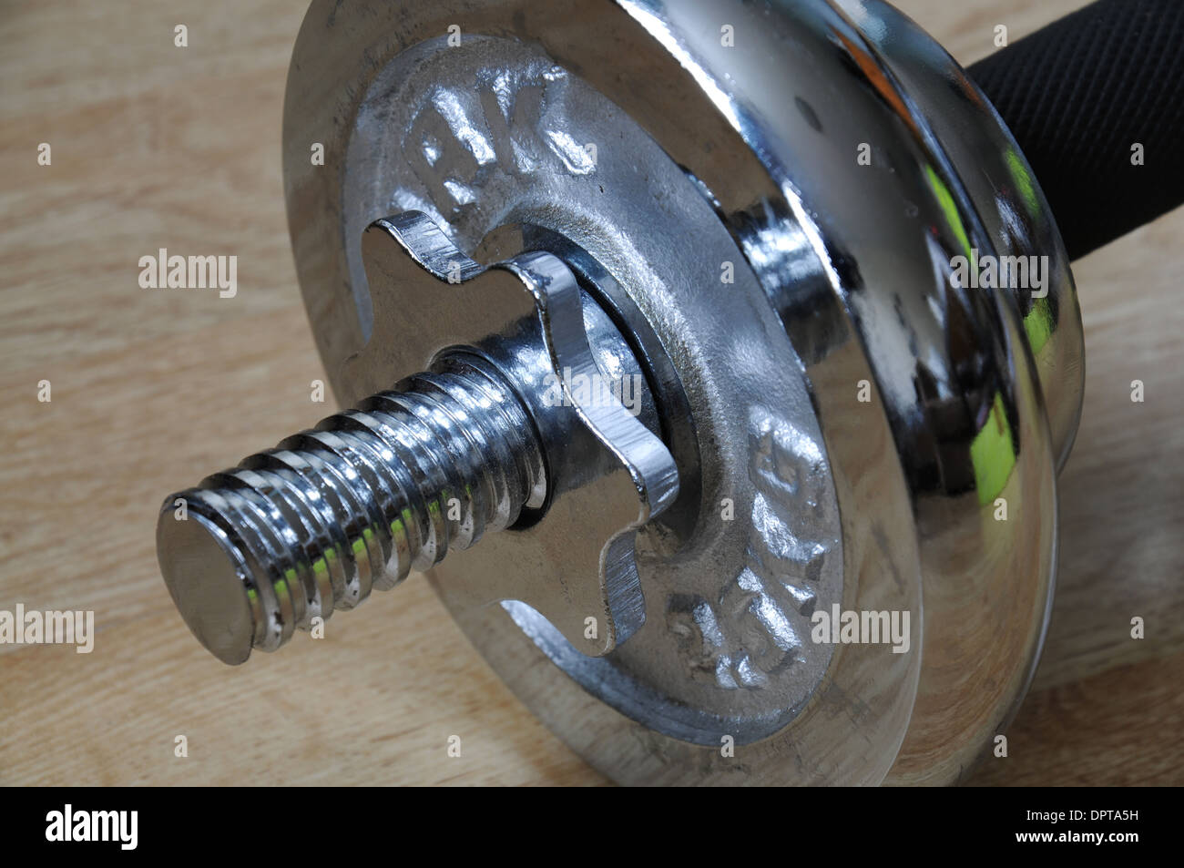 Closeup view of some heavy duty fitness weights Stock Photo