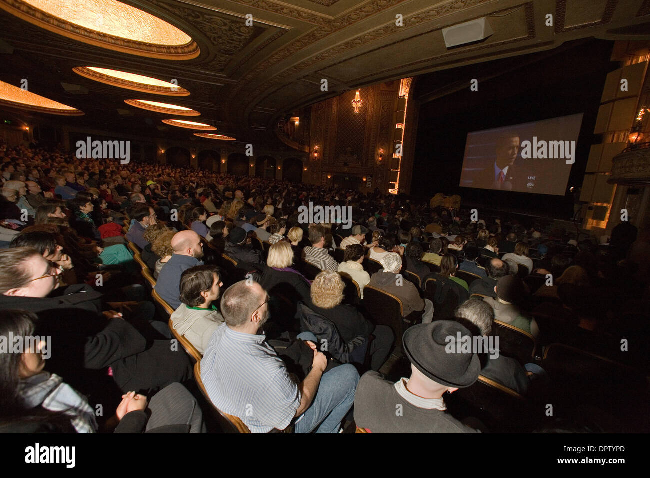 Jan 20, 2009 - Seattle, Washington, USA - Over 2500 people turned out to watch the Obama Inauguration ceremony on a large tv screen at the Paramount theater. It was standing room only in the venu, as Obama was sworn in as the 44th president of the United States. (Credit Image: © Daren Fentiman/ZUMA Press) Stock Photo