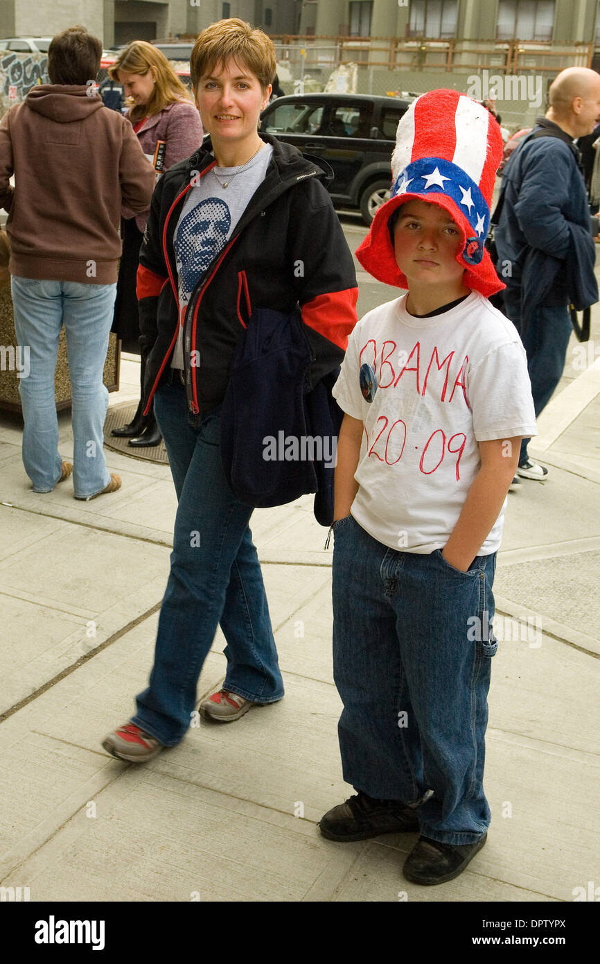 Jan 20, 2009 - Seattle, Washington, USA - Over 2500 people turned out to watch a large TV screen at the Paramount Theatre in Seattle, WA. It was standing room only in the venue as Barack Obama was sworn in as the 44th president of the United States. (Credit Image: © Daren Fentiman/ZUMA Press) Stock Photo