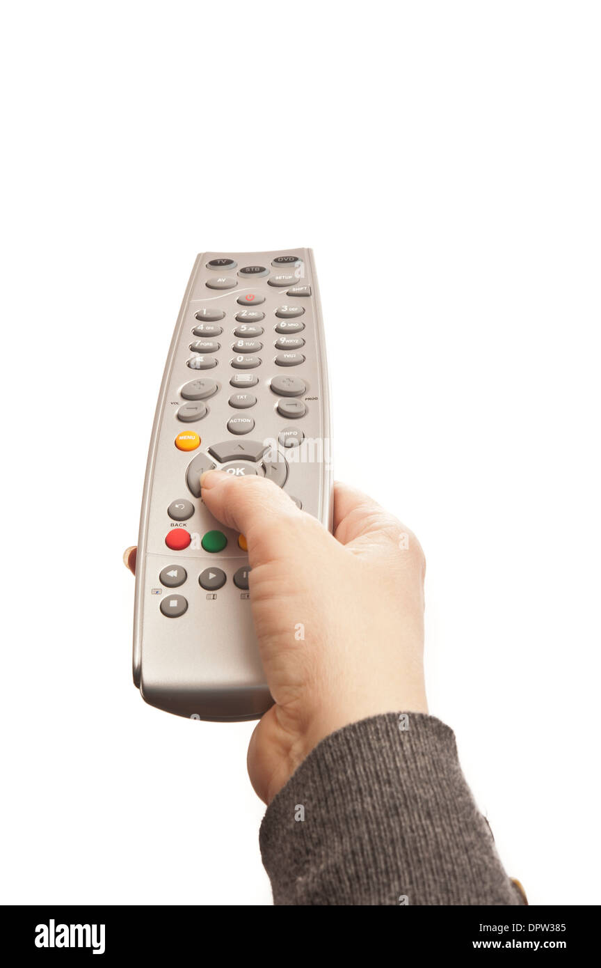 woman holding a TV remote control Stock Photo