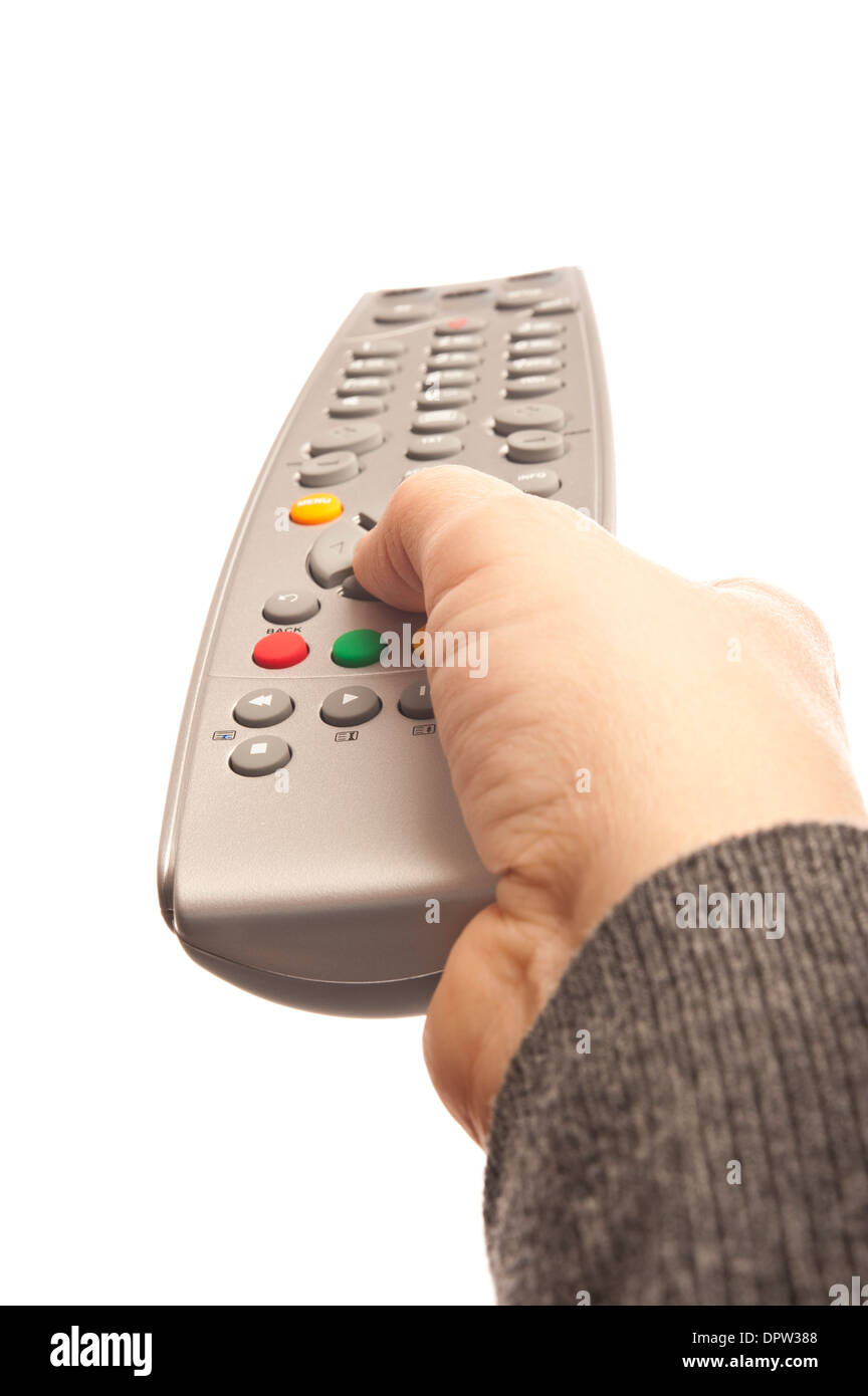 woman holding a TV remote control Stock Photo