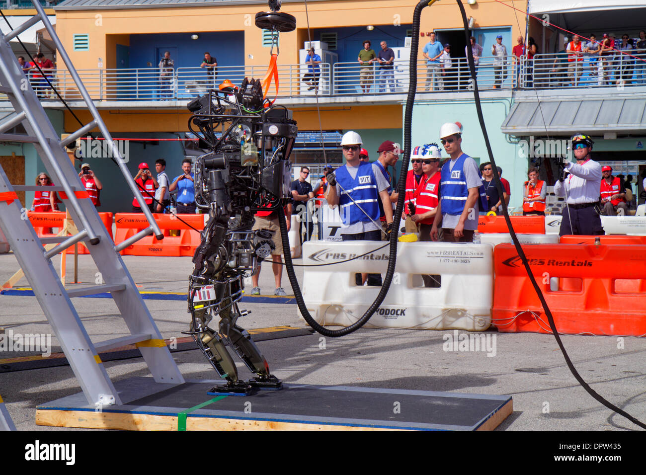 Miami Florida,Homestead,Speedway,DARPA Robotics Challenge Trials,remote controlled,robot,robots,man men male,student students engineering,climbing lad Stock Photo