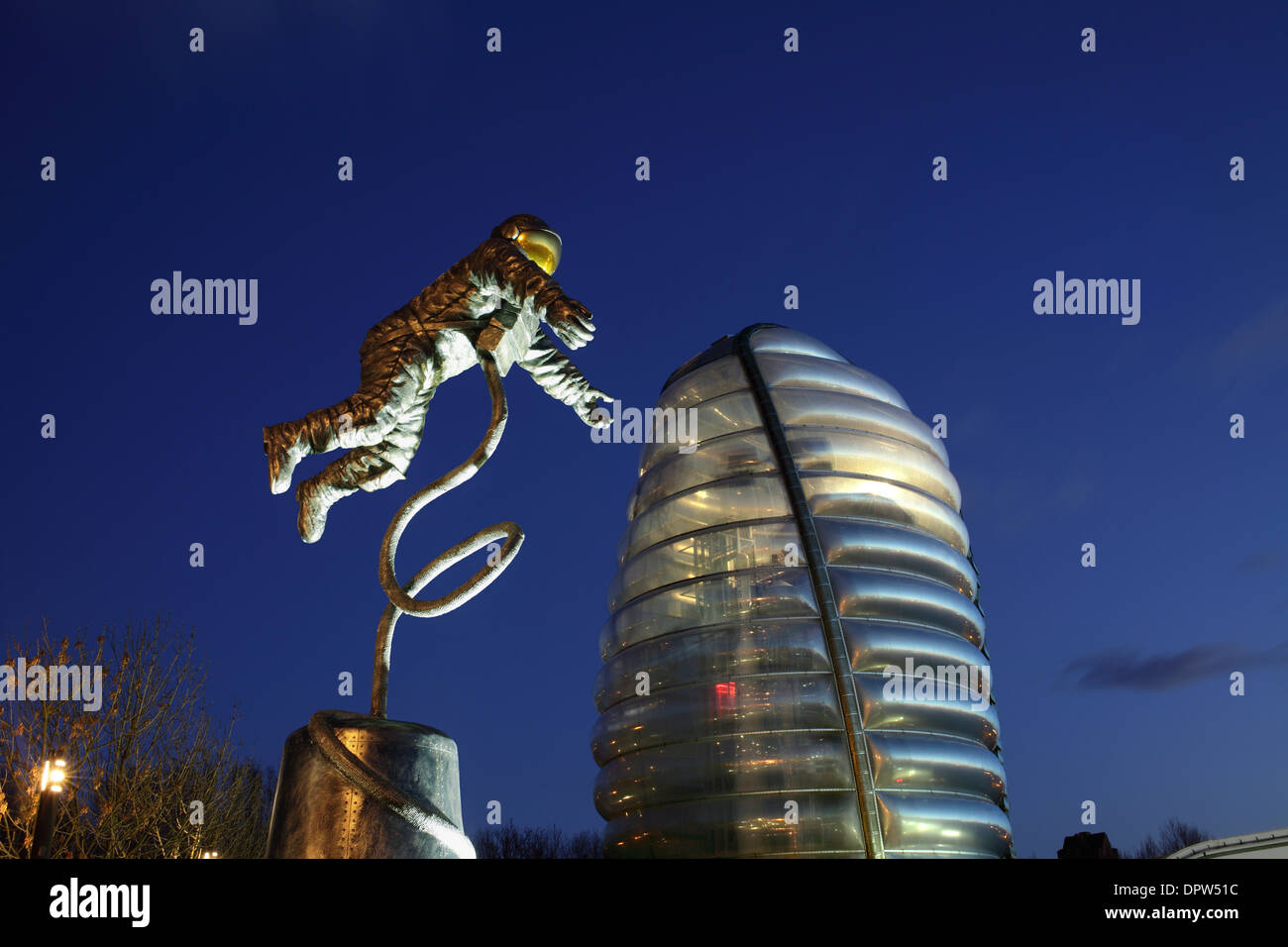'The Pioneer', a statue of US astronaut Ed White walking in space, outside the National Space Centre, Leicester. Stock Photo