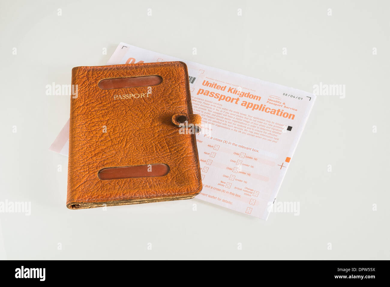 United Kingdom passport application form and empty passport holder Stock Photo