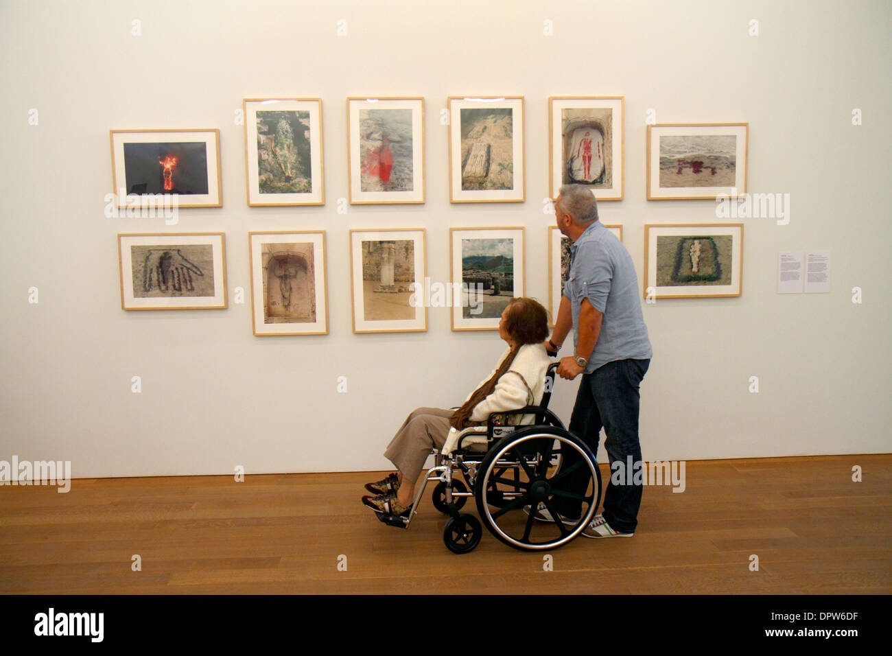 Miami Florida,Museum Park,Perez Art Museum,PAMM,gallery,framed,photographs,man men male,woman female women,disabled,wheelchair,senior seniors citizen Stock Photo