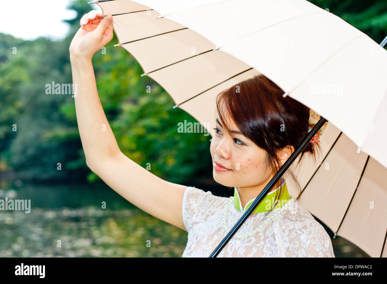 Young Lady Holding Umbrella Stock Photo Alamy