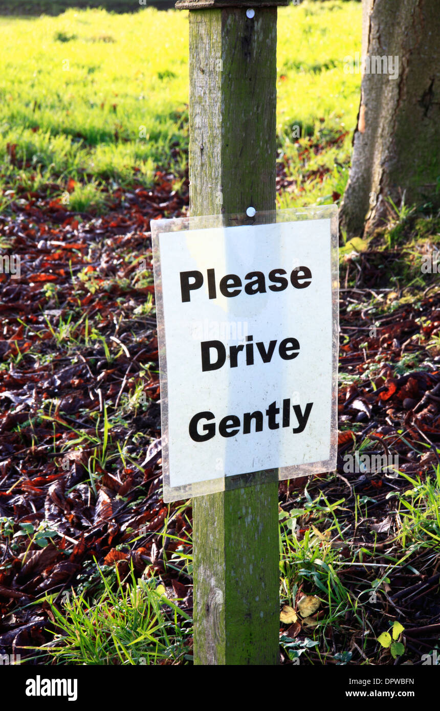 Please drive gently sign at the entrance to the car park at Ranworth Church, Norfolk, England, United Kingdom. Stock Photo