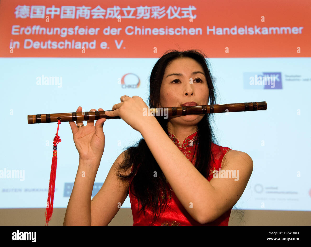 Berlin, Germany. 16th Jan, 2014. A Chinese musician plays a flute