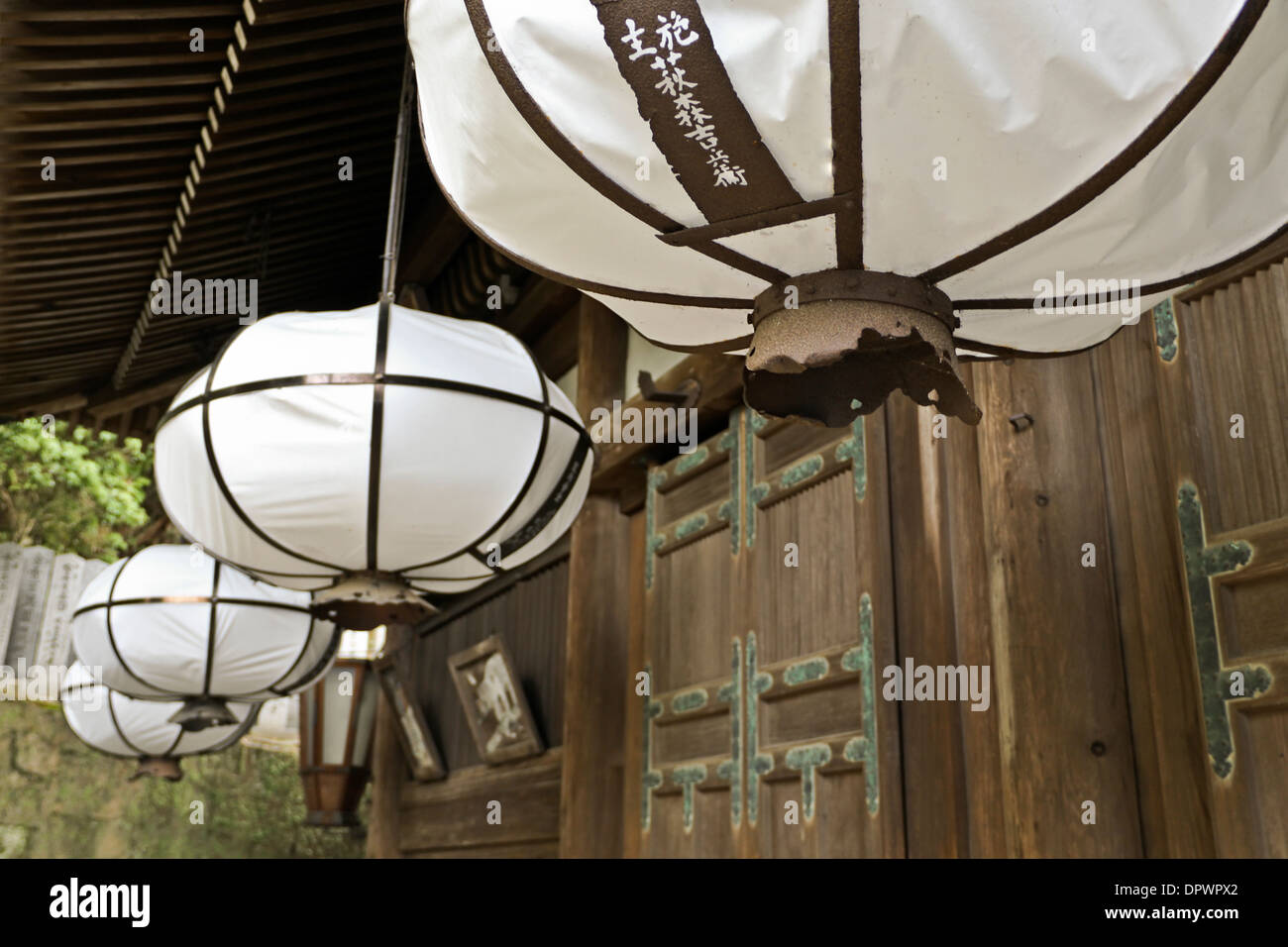 Large paper lanterns hanging at the Sangatsudo Shrine, part of Tōdaiji Temple, Nara, Japan. Stock Photo