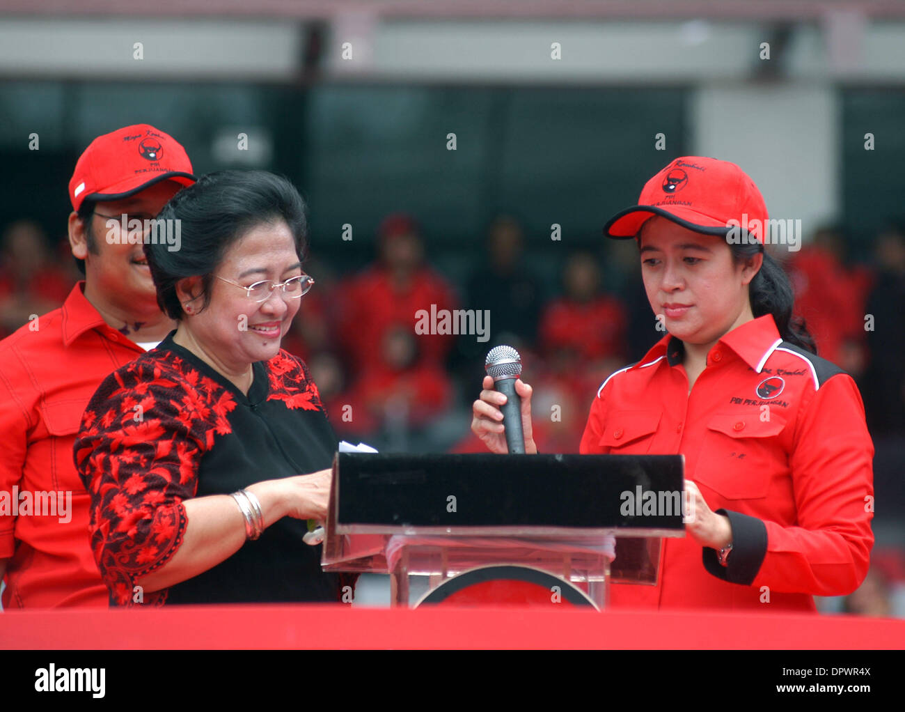 Apr 05, 2009 - Jakarta, Indonesia - Former president and the leader of the Indonesian Democratic Party in Struggle (PDI Perjuangan), MEGAWATI SUKARNO PUTRI  (L) with her daughter PUAN MAHARANI (R) during the campaign in Jakarta, Indonesia, April 4, 2009. Legislative elections for the 128 seats of the Regional Representatives Council and the 560 seats of the People's Representative  Stock Photo