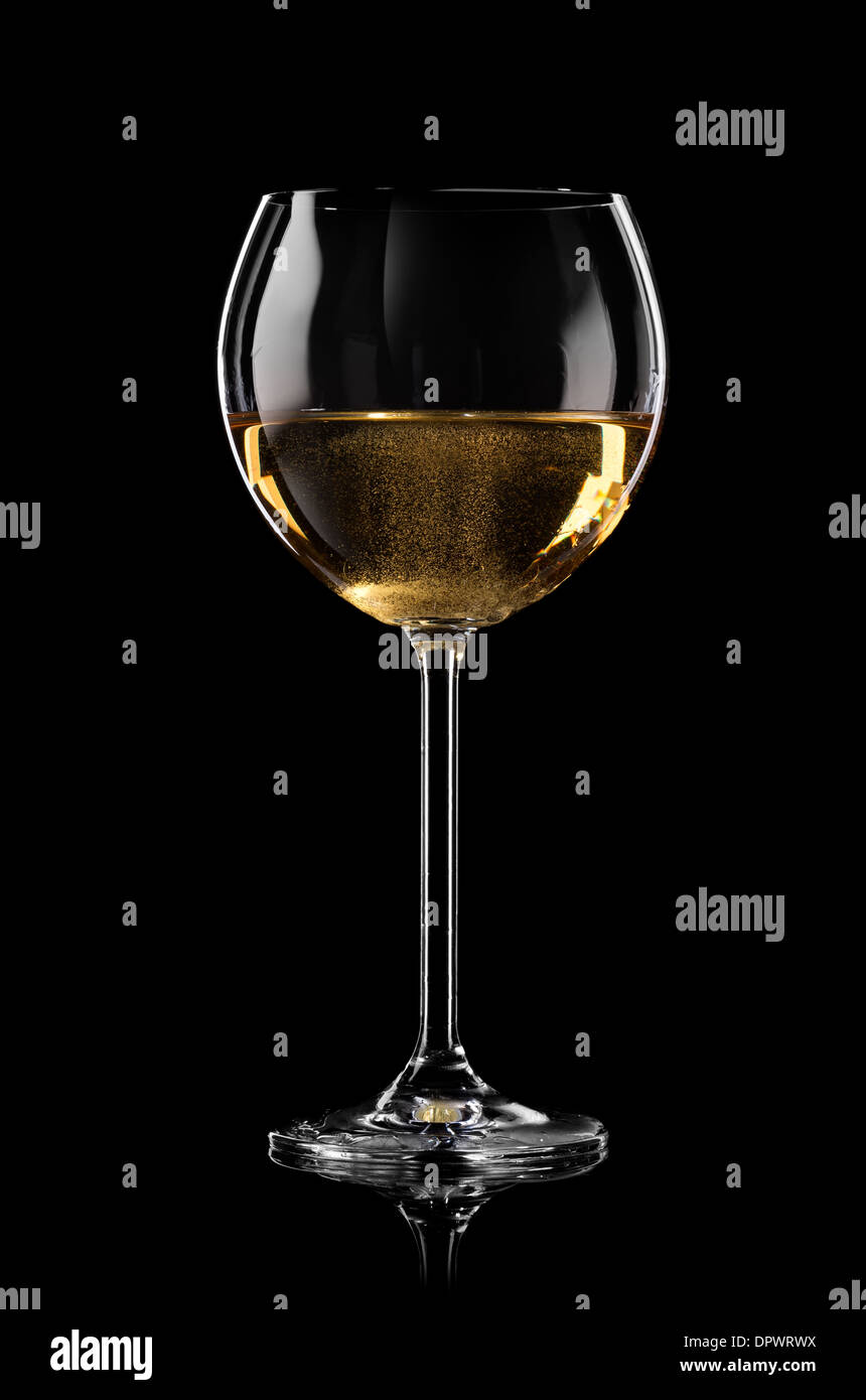 White wine glass black background hi-res stock photography and images