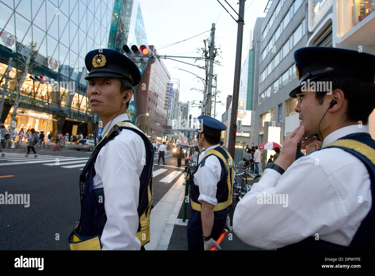 May 03, 2009 - Tokyo, Japan - Police officers direct traffic during a demonstration on the streets of Tokyo involving Japanese activists protesting about Japan's economic issues. (Credit Image: © Christopher Jue/ZUMA Press) Stock Photo
