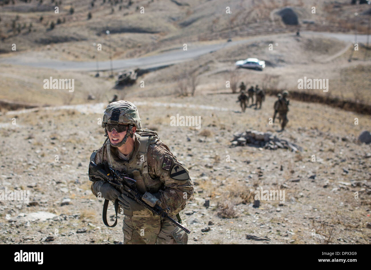 US Army soldiers conduct a presence patrol around the US Consulate January 5, 2014 in Herat, Afghanistan, Jan. 5, 2014. Stock Photo
