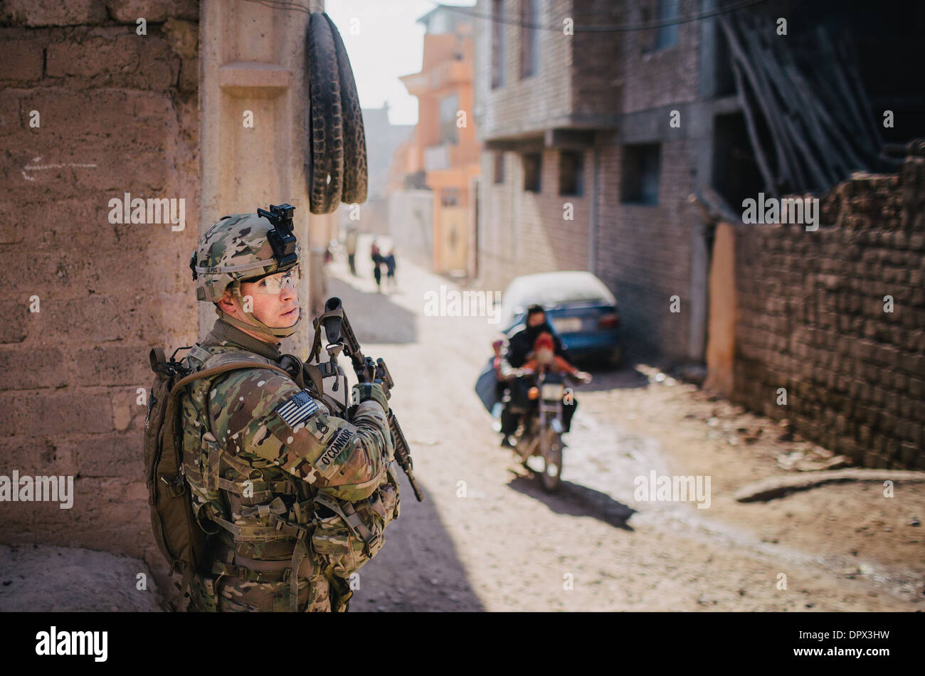 US Army soldiers conduct a presence patrol around the US Consulate January 5, 2014 in Herat, Afghanistan, Jan. 5, 2014. Stock Photo