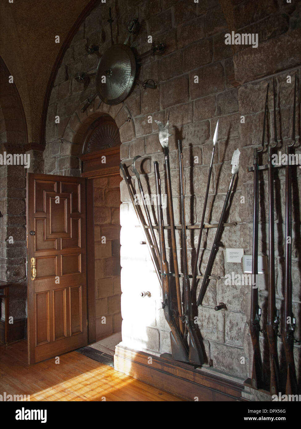 Musket rifles on display in the Armoury Bamburgh Castle Northumberland England UK Stock Photo