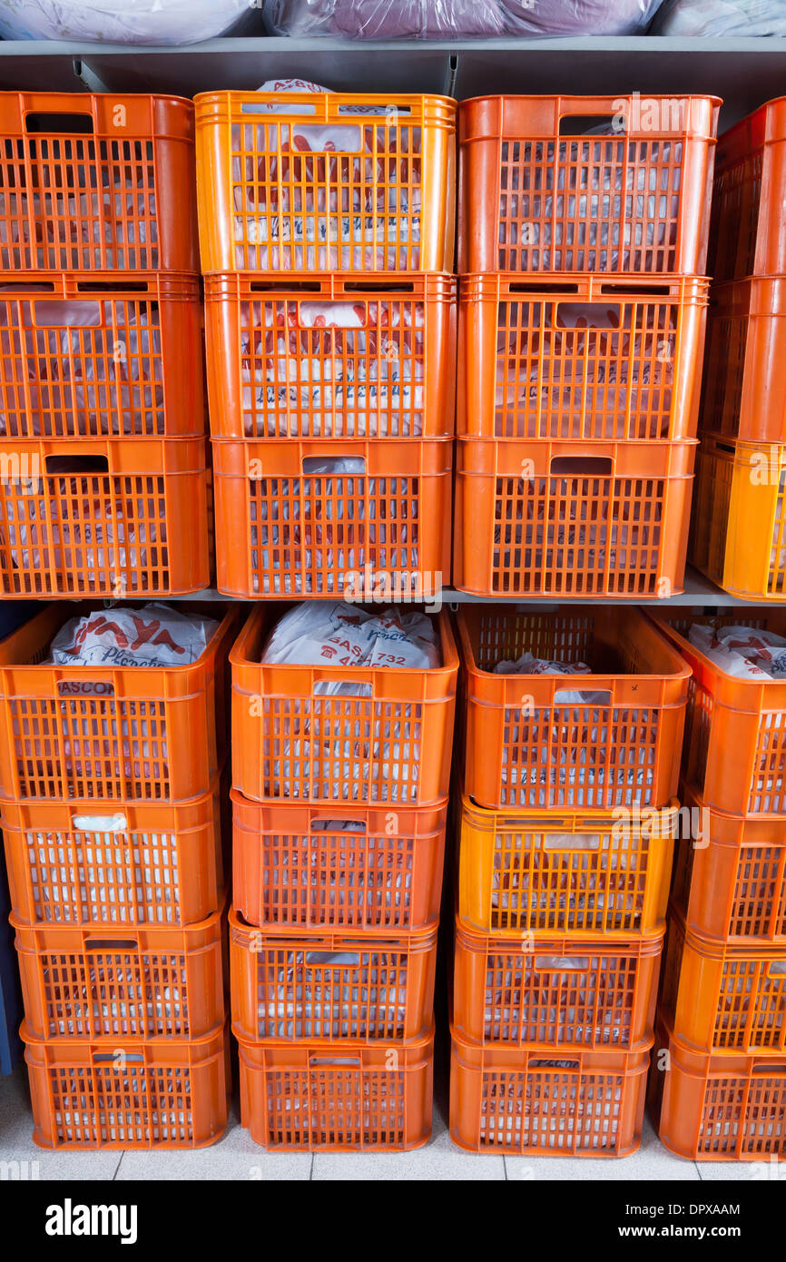 Laundry Baskets In Shelves Stock Photo Alamy