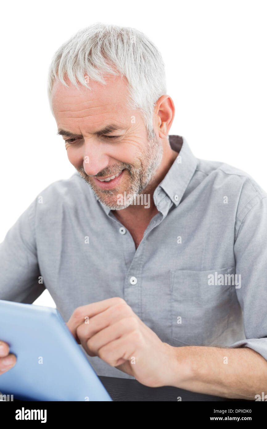 Mature businessman using digital tablet Stock Photo