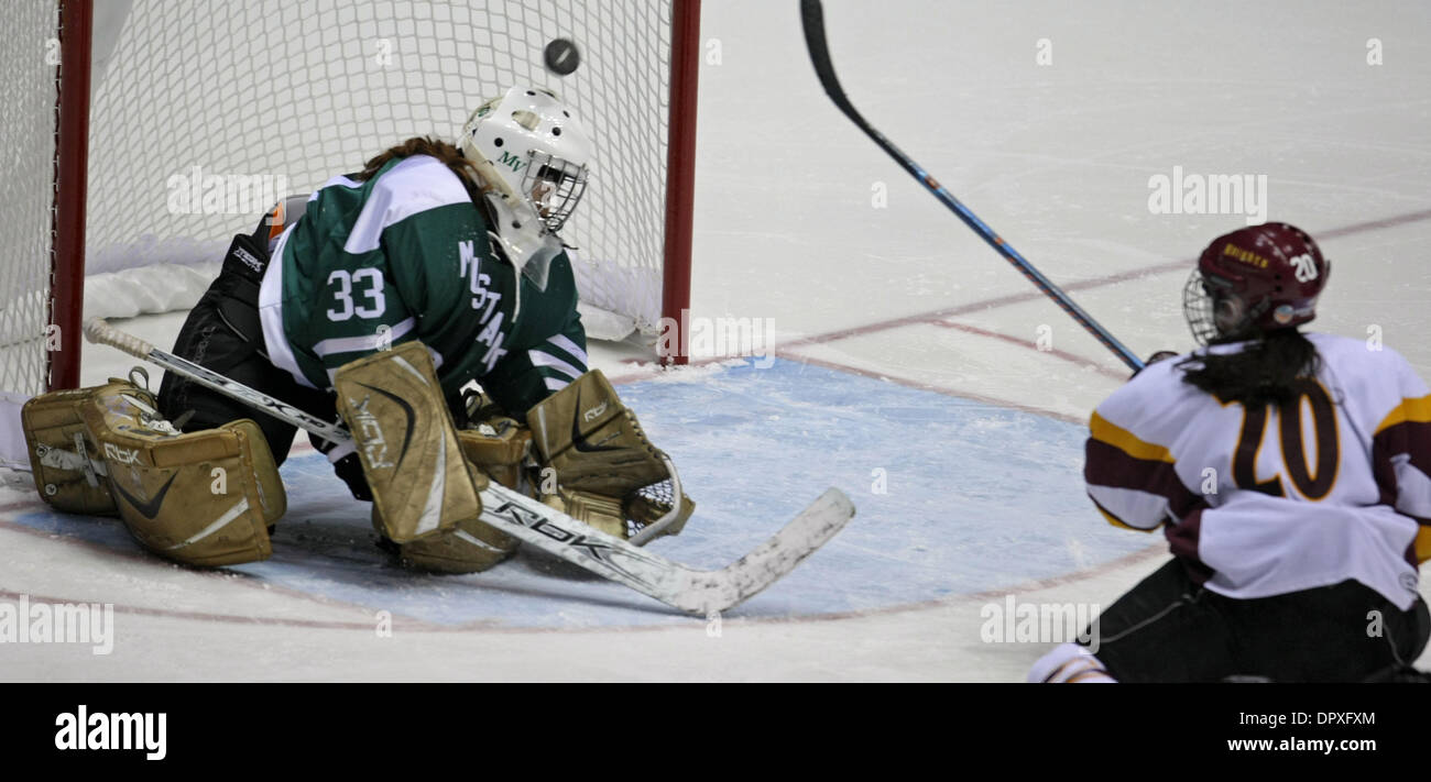 BRUCE BISPING â€¢ bbisping@startribune.com St. Paul, MN., Friday, 2/20/2009]  Girls Class 2A, Section 5 championship, Mounds View vs. Irondale.  (left to right)  Mounds View's Lairen Anderson defended as Irondale's Meghan Lorence shot the puck on a break-away in 3rd period action. (Credit Image: © Bruce Bisping /Star Tribune/ZUMA Press) Stock Photo