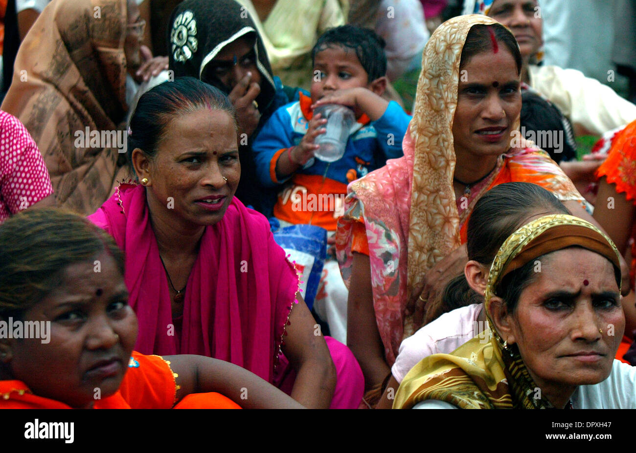 Apr 14, 2009 - New Delhi, India - Dalit Community people listen to the speech of  Indian leader of opposition Sabha (LS) and Bhartiya Janata Party's (BJP) Prime Ministerial candidate Advani during an event to mark the 118th birth anniversary of an Indian freedom fighter and the Chief architect of the Indian constitution the Late Bhimrao Ramji Ambedker.  (Credit Image: © M Lakshman/ Stock Photo